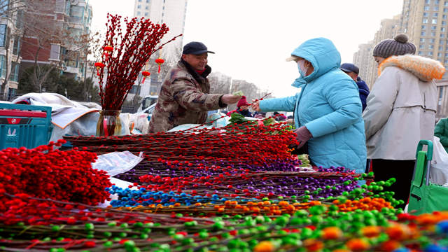 年货“赶早集”，烟火“煲”新春